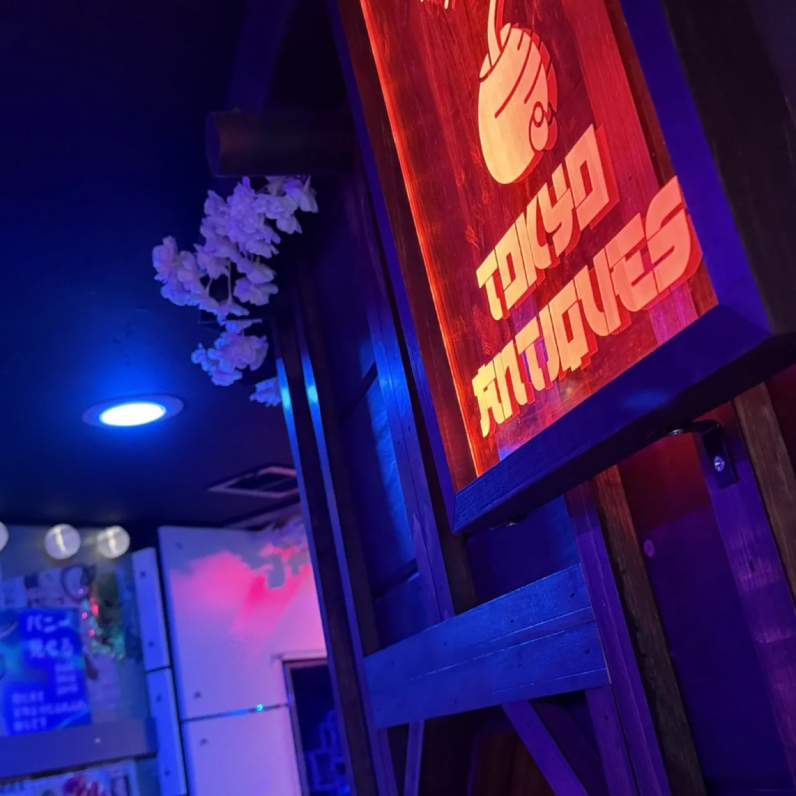 The Tokyo Antiques sign inside the actual Neon Tokyo room